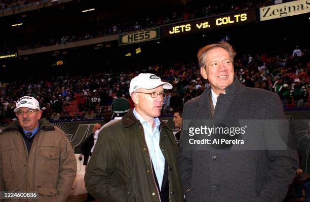New York Jets Owner Woody Johnson chats with New York State Governor George Pataki when he attends the New York Jets vs Indianapolis Colts Playoff...