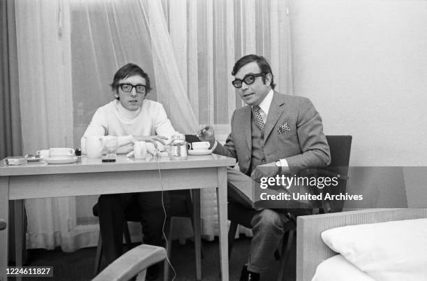 German actor Claus Biederstaedt with photographer Heinz Browers, Germany, 1970s.