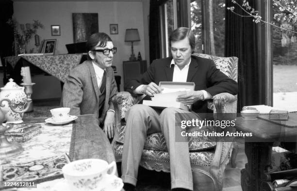 German actor Karlheinz Boehm with photographer Heinz Browers, Germany, 1970s.