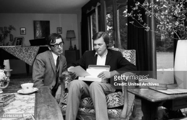 German actor Karlheinz Boehm with photographer Heinz Browers, Germany, 1970s.