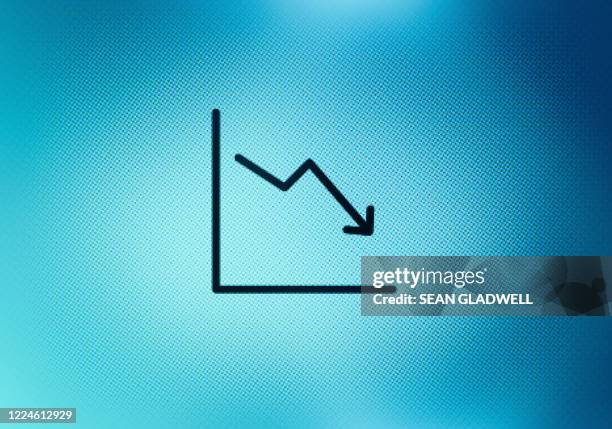 downward graph icon on screen - line graph stock-fotos und bilder