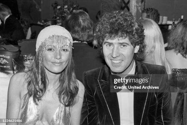 Producer Jack White with Marie Louise Gassen at the Deutscher Filmball on January 15th 1980 at Munich, Germany, 1980s.