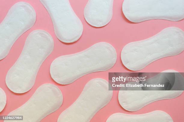 sanitary pads over pink background - sports period stock pictures, royalty-free photos & images