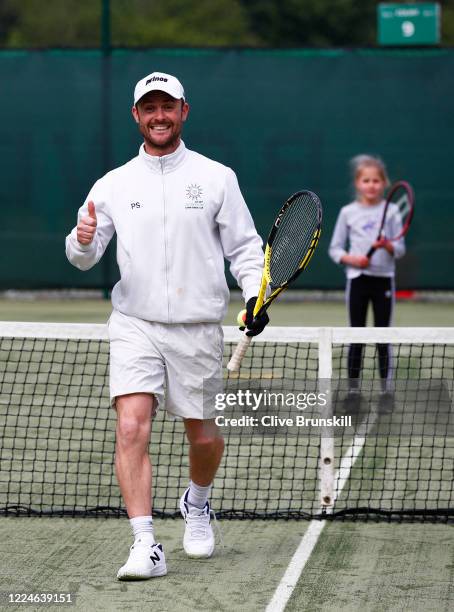 Phil Spencer, Cheshire coach of the year 2019 in good spirits at the Bowdon Lawn Tennis Club whilst coaching 9-year-old club member Gigi Welch, today...