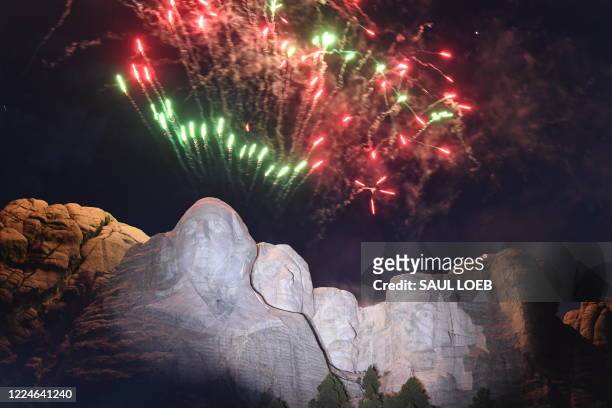 Fireworks explode above the Mount Rushmore National Monument during an Independence Day event attended by the US president in Keystone, South Dakota,...