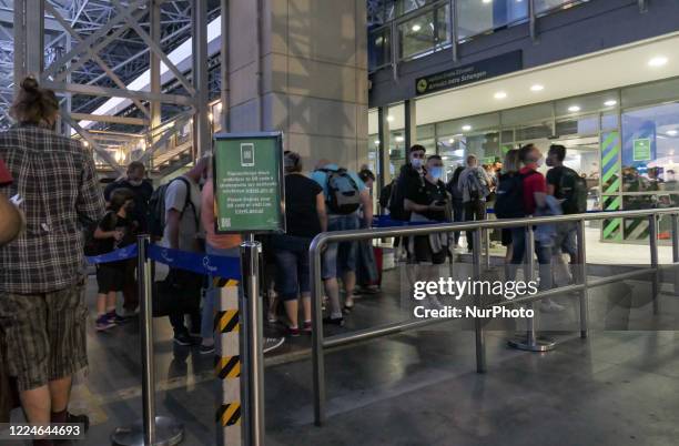 Passengers arrived from Vienna, Austria wearing facemasks are checked for the county's entry form and are tested for Coronavirus at Thessaloniki...