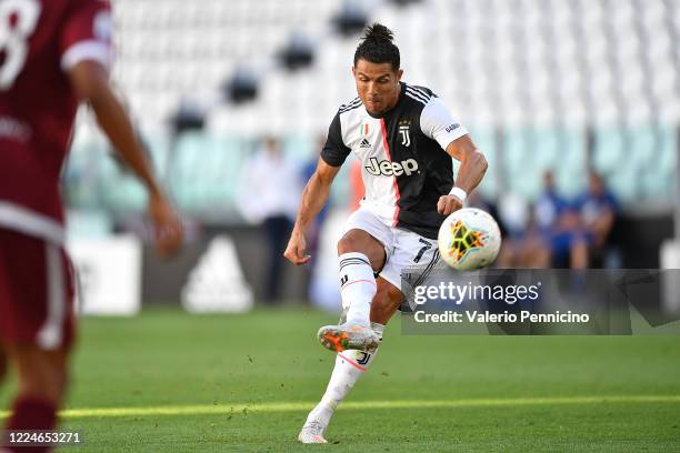 Cristiano Ronaldo of Juventus scores a goal during the Serie A match between Juventus and Torino FC at Allianz Stadium on July 4, 2020 in Turin,...