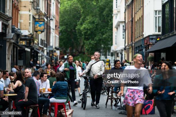 Customers enjoying their drinks in Soho during the &quot;Super Saturday&quot; in London, Britain, 04 July 2020. Pubs, restaurants, hotels and...