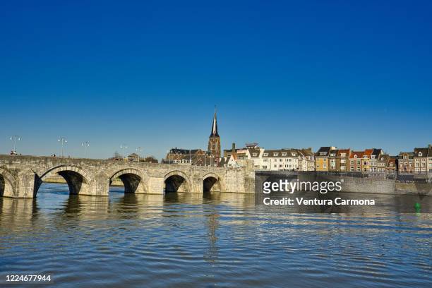 the meuse river at maastricht, the netherlands - limburg netherlands stock pictures, royalty-free photos & images