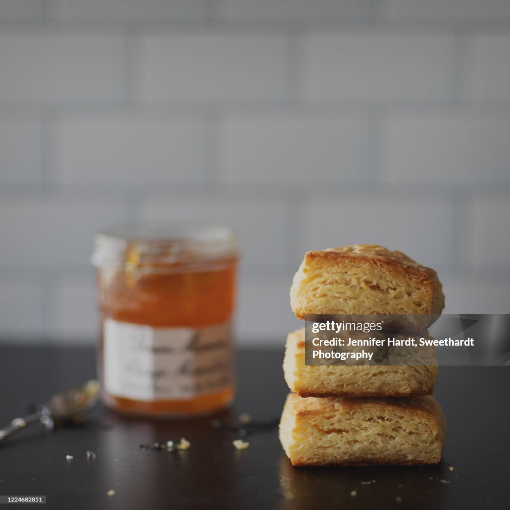 Stack of Buttermilk Biscuits and jam jar
