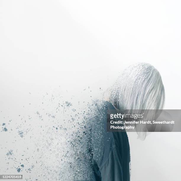 composite image of a woman in profile using dispersion effect - deterioration stock pictures, royalty-free photos & images