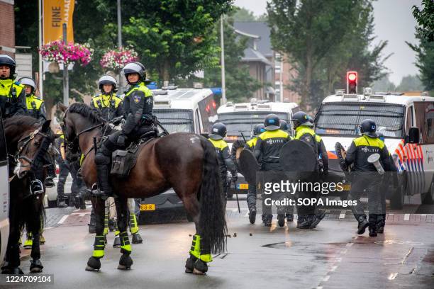 Police Officers seen on horse back heading to stop the illegal demonstrations. Police officers from the Mobile Unit in Lombok district, stop illegal...