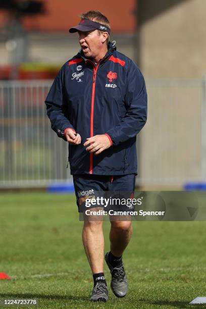 Roosters head coach Trent Robinson watches his players train during a Sydney Roosters NRL training session at Kippax Lake Field on May 14, 2020 in...