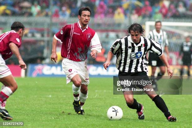 Alessandro Del Piero of Juventus controls the ball under pressure of Hidetoshi Nakata of Perugia during the Serie A match between Perugia and...
