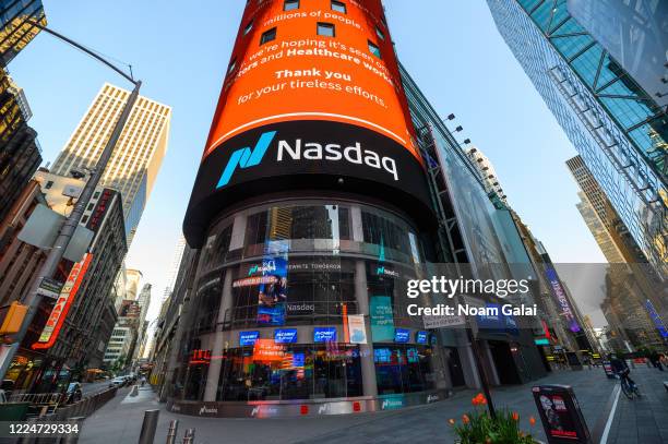 View outside Nasdaq in Times Square during the coronavirus pandemic on May 13, 2020 in New York City. COVID-19 has spread to most countries around...