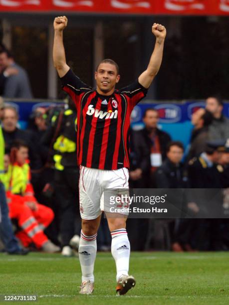 Ronaldo of AC Milan celebrates scoring the opening goal during the Serie A match between Inter Milan and AC Milan at the Stadio Giuseppe Meazza on...