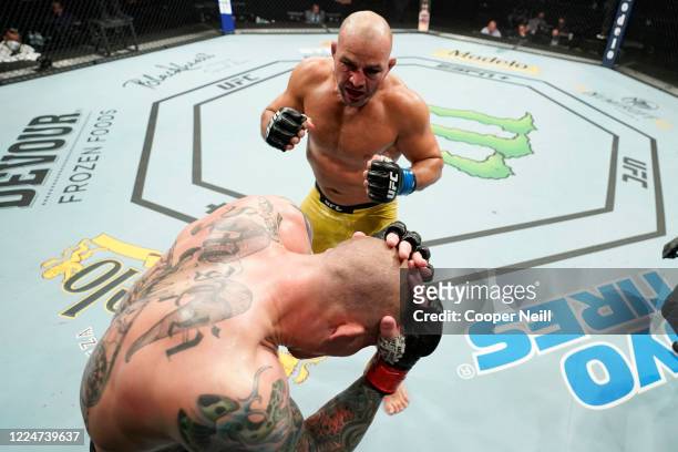 Glover Teixeira of Brazil fights Anthony Smith in their light heavyweight bout during the UFC Fight Night Event at VyStar Veterans Memorial Arena on...