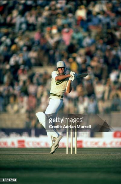 Imran Khan of Pakistan in action during his century in the First Test match against the West Indies at the Gaddafi Stadium in Lahore, Pakistan. The...