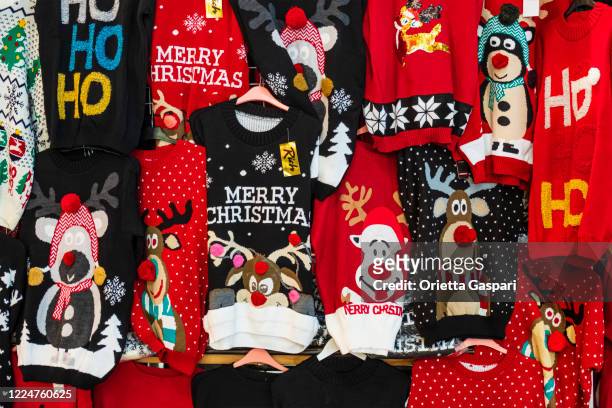 christmas sweaters - ugliness stock pictures, royalty-free photos & images