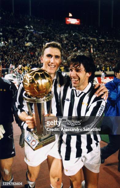 Alen Boksic and Alessandro Del Piero of Juventus celebrate the victory with the trophy after winnig the 1996 Intercontinental Cup match between...