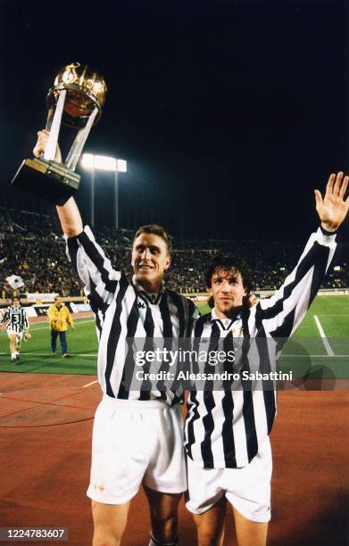 Alen Boksic and Alessandro Del Piero of Juventus celebrate the victory with the trophy after winnig the 1996 Intercontinental Cup match between...