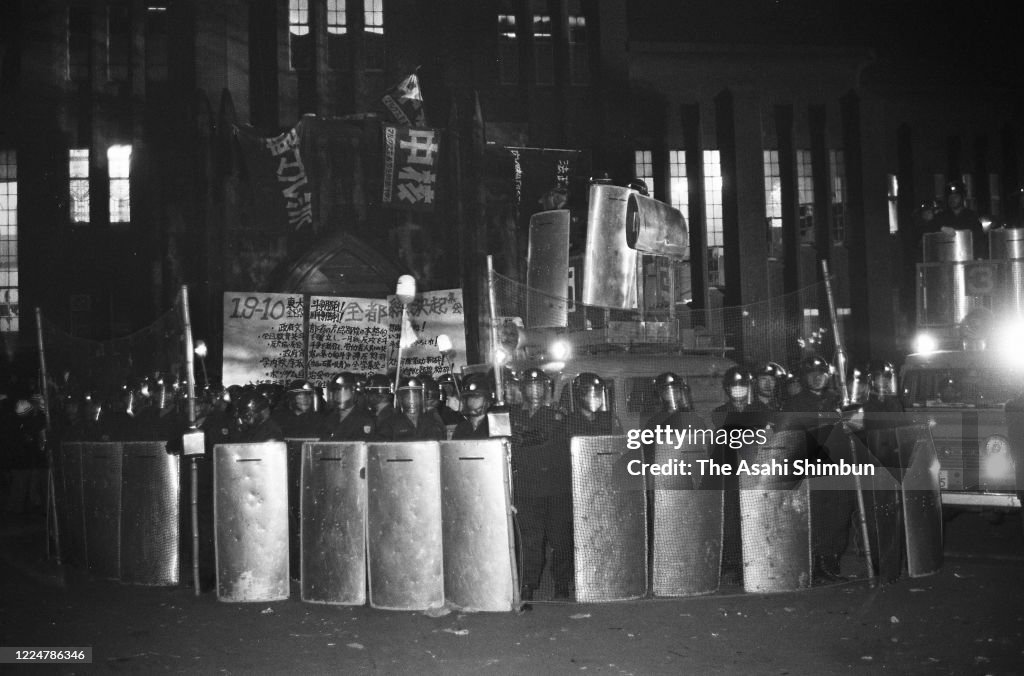 1968 Japan Riots Riot police stand guard to close the access to the Yasuda Auditorium ...