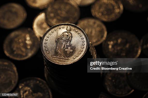 swiss franc coins - swiss culture stock pictures, royalty-free photos & images