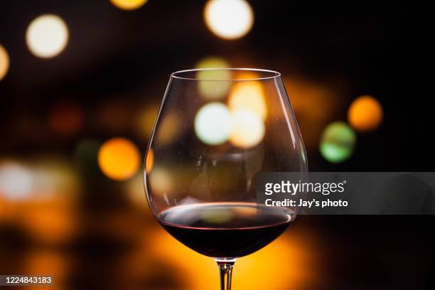 wine in city abstract background - shiraz stockfoto's en -beelden