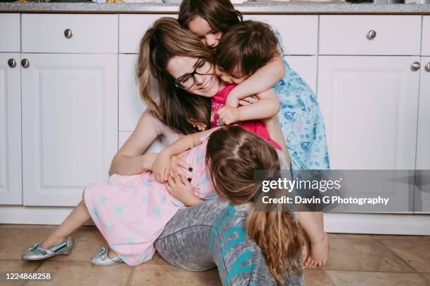 motherly love - busy mom stock-fotos und bilder