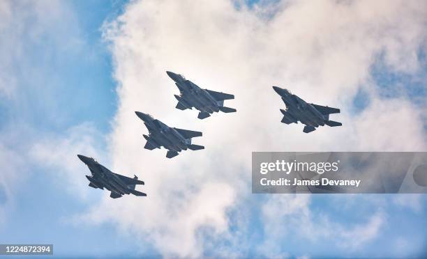 Eagles fly over the Hudson River during the "Salute to America" military flyover on July 4, 2020 in New York City.