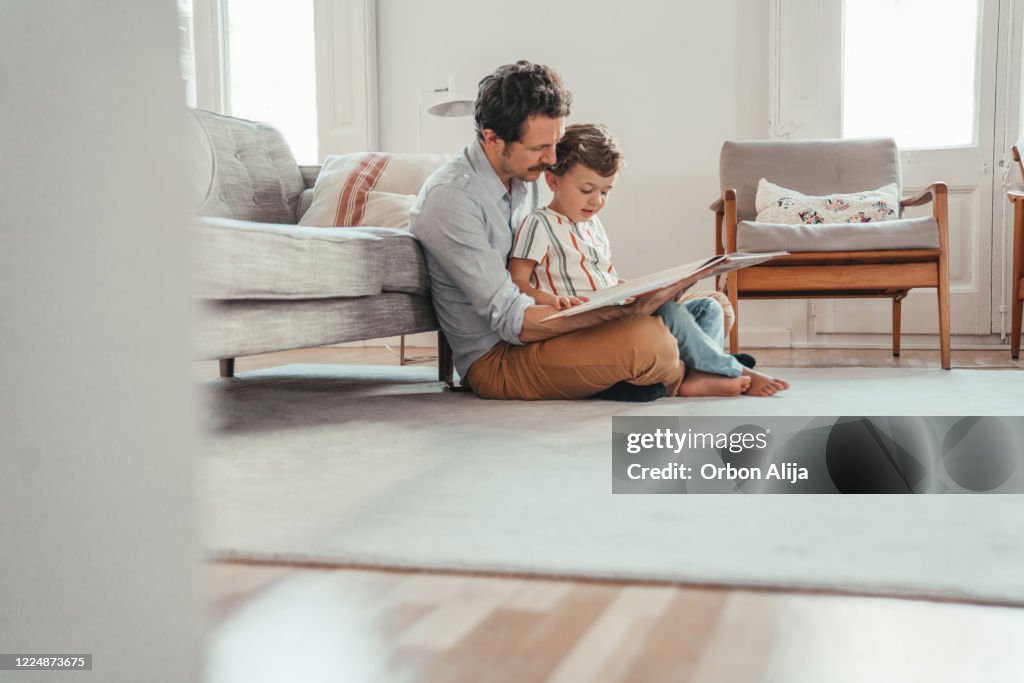 Family reading a book