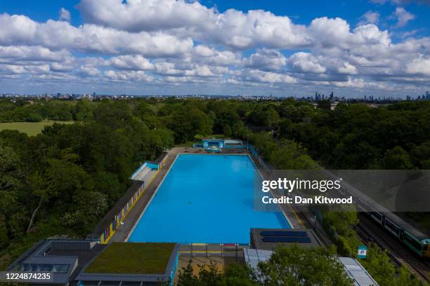 General view of Tooting Bec Lido on May 14, 2020 in London, United Kingdom. As temperatures rise across Britain, its large public pools remained...