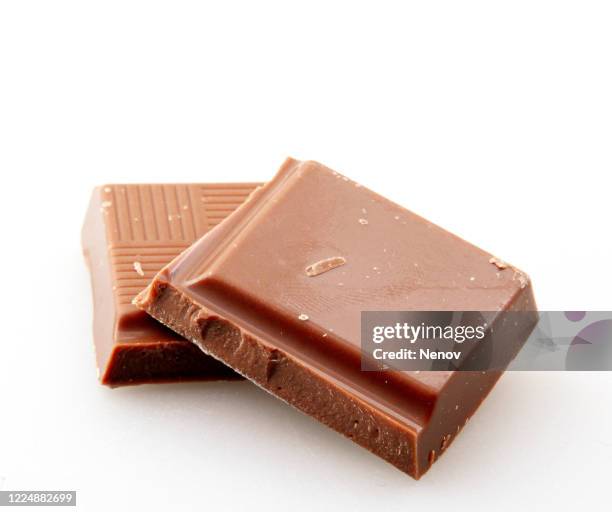 milk chocolate isolated on white background - caramel block stock pictures, royalty-free photos & images