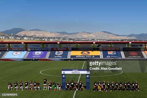 The North Carolina Courage and Chicago Red Stars take a knee during the national anthem before a game on day 5 of the NWSL Challenge Cup at Zions...