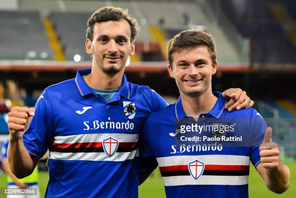 Manolo Gabbiadini and Karol Linetty of Sampdoria celebrate the clubs victory after the Serie A match between UC Sampdoria and SPAL at Stadio Luigi...