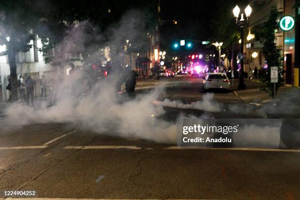 Police confront demonstrators as Black Lives Matter supporters demonstrate in Portland, Oregon on July 4, 2020 for the thirty-eighth day in a row at...