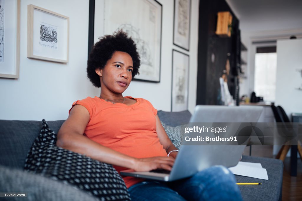 An unemployed woman looking for work from home in a modern age