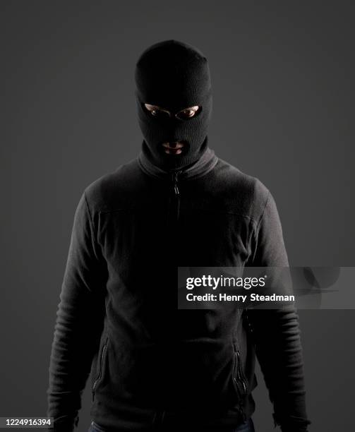 balaclava criminal - balaclava stock pictures, royalty-free photos & images