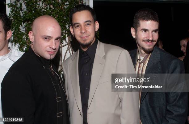 Dave Draiman of Disturbed, Mike Shinoda and Brad Delson of Linkin Park attend the Warner Brothers post Grammy party on February 27, 2002 in...