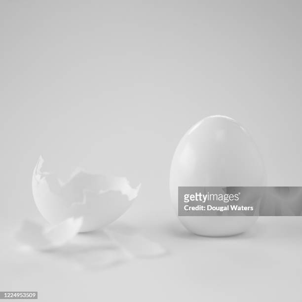 boiled chicken egg with shell removed on white background. - boiled egg stock pictures, royalty-free photos & images