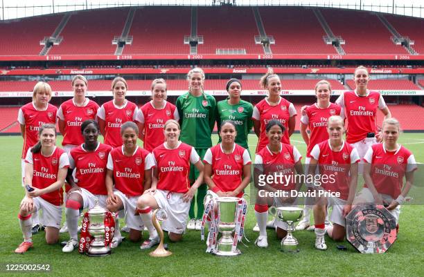 The Arsenal Womens team with the Womens FA Cup Trophy, Womens UEFA Cup Trophy, Womens League Cup Trophy, Womens Premier League Trophy and the Womens...