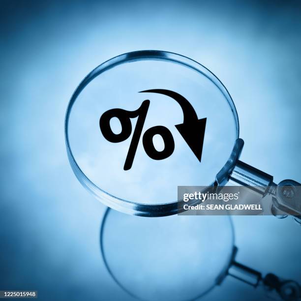 falling percentage rate - lower interest rate stock pictures, royalty-free photos & images
