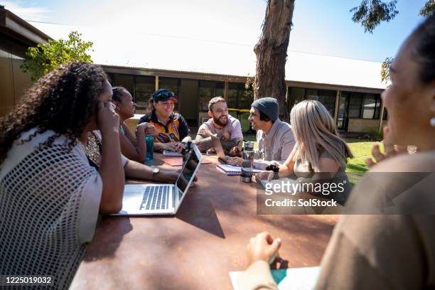 tutoring in the sun - aboriginal australia stock pictures, royalty-free photos & images