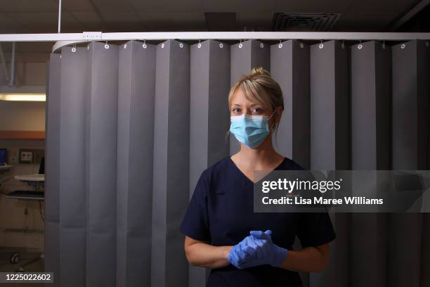 Registered Nurse Clancy Spencer poses in the clinical assessment room at St George Hospital COVID-19/ Flu Assessment Clinic on May 15, 2020 in...