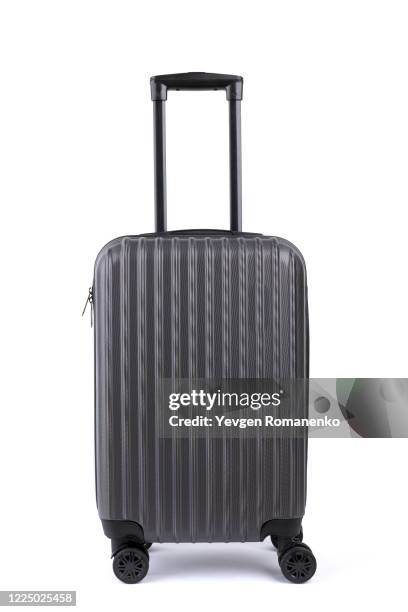 suitcase isolated on white background - wheeled luggage stock-fotos und bilder