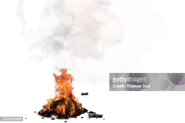 bonfire against white background - kaminfeuer stock-fotos und bilder