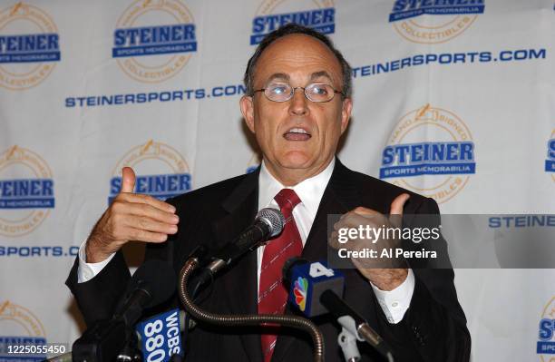 Former New York City Mayor Rudy Guiliani and New York Yankees Manager Joe Torre appear at a baseball signing-event with a 9/11 theme on June 6 in New...