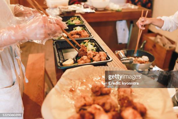 making bento in japan - karaage stock pictures, royalty-free photos & images