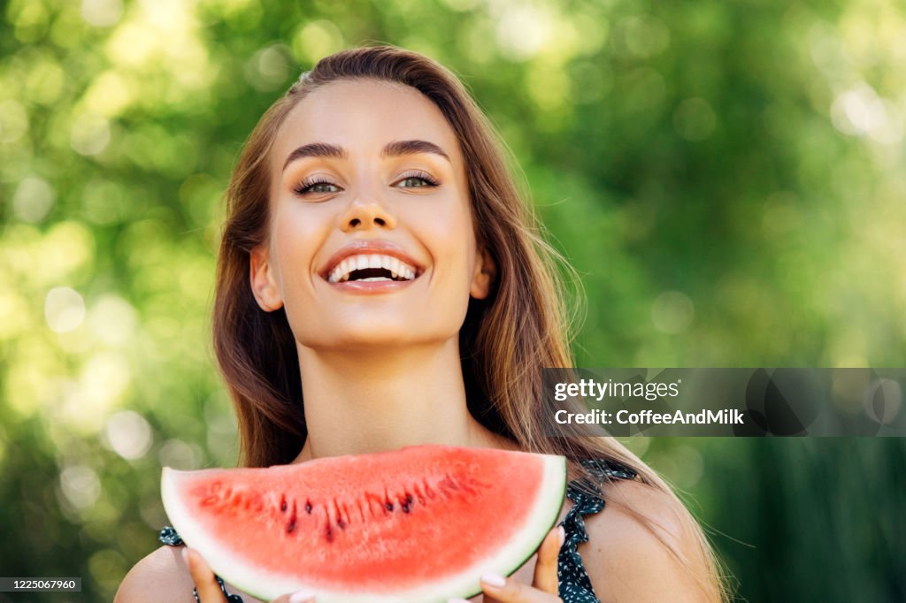 Enjoying Sunny Day Wile Eating Watermelon High-Res Stock Photo - Getty ...