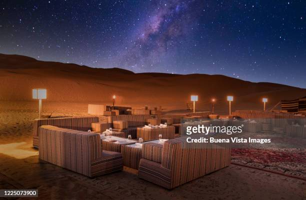 tables set for dinner in desert - evening meal restaurant stock pictures, royalty-free photos & images